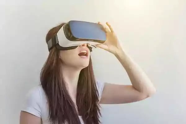Woman wearing a VR headset.