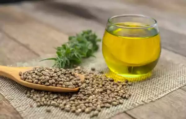 Hemp oil in a clear glass.