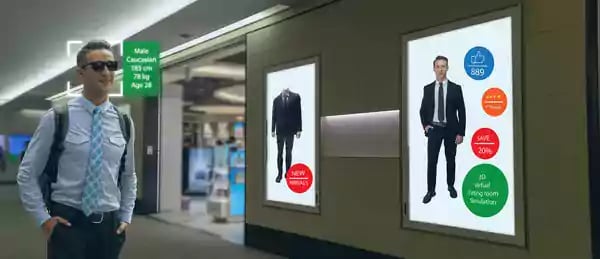 Man walking through a mall.