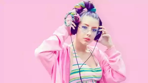 Woman wearing headphones.