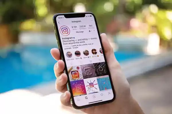 Phone with the instagram app displayed.