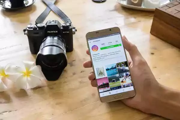 instagram user with camera
