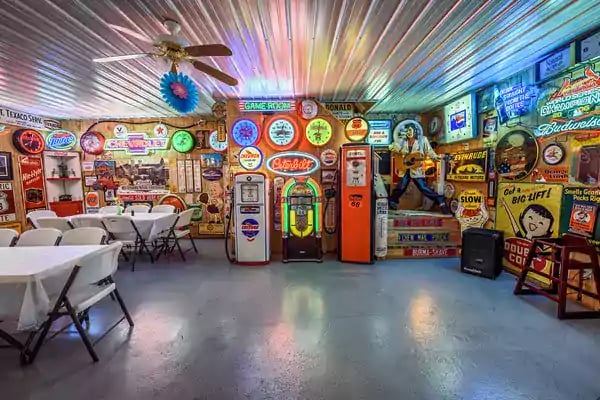 Function hall with neon signs covering all over the walls.